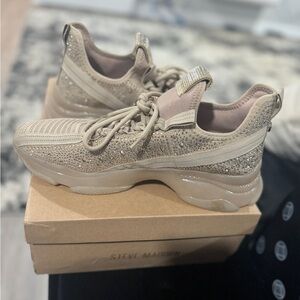 Size 12 women Steve Madden shoes, they are tan in color